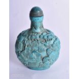A Carved Turquoise Snuff Bottle. 8.8cm x 6.2cm x 3.3cm, weight 141g