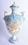 Royal Worcester fine rare vase and cover painted in prismatic enamels with butterflies flying around