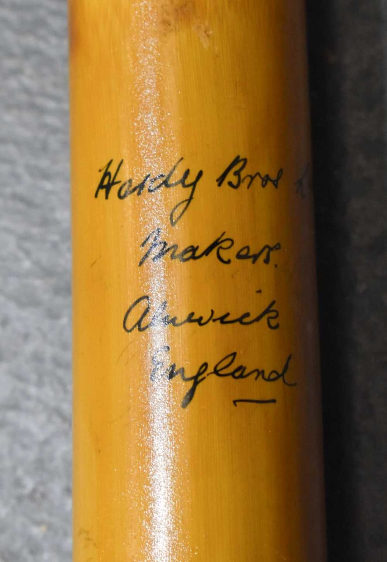 A VERY LARGE BAMBOO FISHING POLE and Hardys rod. (2) - Image 2 of 7