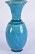 AN UNUSUAL TURQUOISE GLAZED STUDIO POTTERY VASE signed CB within a vase. 15 cm high.