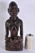 AN AFRICAN TRIBAL CARVED WOOD FERTILITY FIGURE. 36 cm x 15 cm.