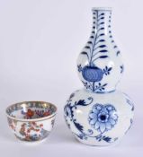 A 19TH CENTURY MEISSEN BLUE AND WHITE PORCELAIN GOURD VASE together with a Meissen teabowl.