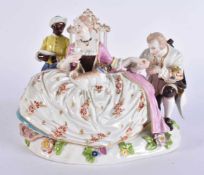 AN UNUSUAL ANTIQUE GERMAN PORCELAIN FIGURAL GROUP possibly Meissen, modelled as a female, male and