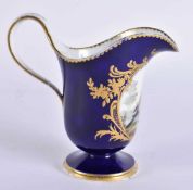 A FINE 18TH/19TH CENTURY FRENCH SEVRES PORCELAIN CREAM JUG painted with a bird. 11 cm x 11 cm.
