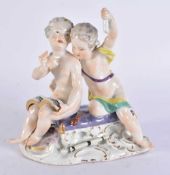 AN ANTIQUE MEISSEN PORCELAIN FIGURAL GROUP. 16 cm x 12 cm.