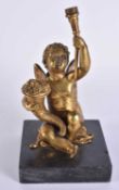 A LOVELY 18TH/19TH CENTURY EUROPEAN GILT BRONZE INKWELL formed as a seated putti holding aloft a