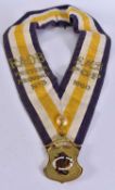 A MASONIC ROYAL ORDER OF THE BUFFALOS WESTERN PROVINCE SASH with attached enamelled medallion. 108