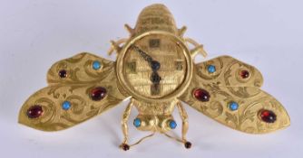 A RARE EARLY 20TH CENTURY GILT METAL GEM SET BUTTERFLY MOTH STRUT CLOCK. 22 cm wide.