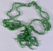 A 14CT WHITE GOLD CLASP STRING JADE BEAD NECKLACE. 163 grams. 77 cm.