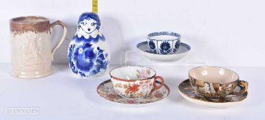 A Russian porcelain doll jar together with two Japanese tea cups a 18th Century Worcester Tea cup