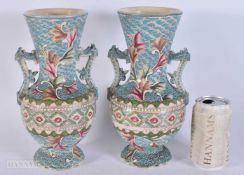 A PAIR OF EARLY 20TH CENTURY JAPANESE MEIJI PERIOD SATSUMA VASES enamelled pin relief with