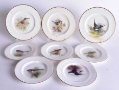 Royal Worcester three ornithological plates painted with different birds titled verso, signed W.
