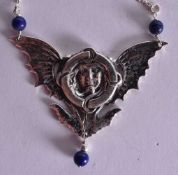 A Sterling Silver and Hardstone Pendant Necklace. Pendant 4.2 cm x 3.4cm, Chain 41cm, weight 14.1g