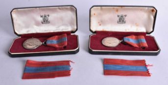 TWO BOXED IMPERIAL SERVICE MEDALS presented to Edwin John George Belcher and William Nedin. (2)