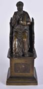 AN 18TH/19TH CENTURY GRAND TOUR BRONZE FIGURE OF A SAINT modelled upon a chair. 18 cm high.