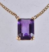 A 9CT GOLD NECKLACE. 2.3 grams. 40cm long, pendant 1 cm x 1 cm.
