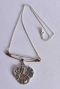 A Sterling Silver Pendant Necklace. Pendant 4.7 cm x 5.9cm, Chain 40cm long, weight 16.9g