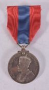 A BOXED MEDAL presented to Herbert Jones.
