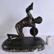 A RARE AND LARGE EARLY 20TH CENTURY GRAND TOUR BRONZE FIGURE OF A FALLEN WARRIOR modelled upon a