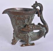 A CHINESE BRONZE JUE CUP. 9 cm x 6.5 cm.
