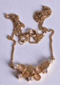 AN 18CT GOLD AND DIAMOND NECKLACE. 4 grams. 45cm long, pendant 3 cm x 2 cm.