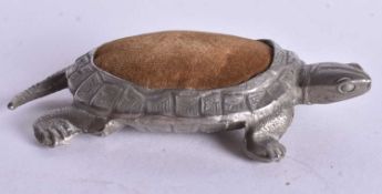 A Chinese Pewter Pin Cushion in the form of a Turtle. Chinese marks to base. 8.5 cm x 5 cm x 1 cm