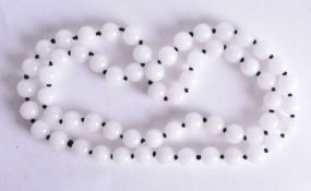 A HARD STONE Bead Necklace. 74cm long. weight 95g