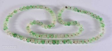 A JADE STRING PUMPKIN BEAD NECKLACE. 106 grams. 88 cm.