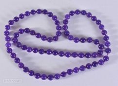 A STRING BEAD AMETHYST NECKLACE. 60 grams. 76 cm.