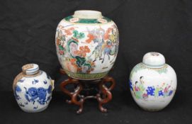 A large 19th Century Ginger jar together with two other Ginger jars one with a wooden stand 23cm (