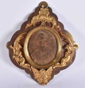 AN EARLY 18TH CENTURY GILT BRONZE AND STUCCO PORTRAIT MEDALLION PLAQUE. 19 cm x 15 cm.