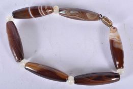 A Chinese Zhu bead necklace , (each bead 4cm )
