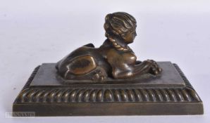 A 19TH CENTURY GRAND TOUR BRONZE EGYPTIAN REVIVAL SPHINX PAPERWEIGHT. 13.5 cm wide.