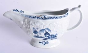 Early 18th century Lowestoft SAUCE BOAT painted with two landscapes, internally painted with