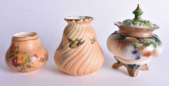 Hadleyware four footed vase and cover painted with roses, a Grainger vase painted with birds on