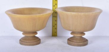 A pair of Chinese carved horn cups 8 x 10cm (2)