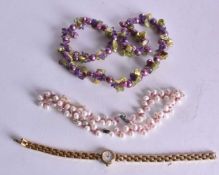 A 9CT GOLD AND PEARL NECKLACE together with a silver and pearl necklace. 84 grams. 45cm long. (2)