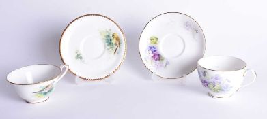 Royal Worcester cup and saucer painted with Chaffinch and Yellow Hammer by David Jones, signed and a