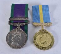 A NORTHERN IRELAND AND HONG KONG SERVICE MEDAL presented to 24763441 Pte S Taylor Staffords. (2)