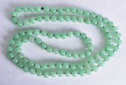 A HARD STONE Bead Necklace. 123cm long, weight 223g