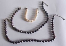 Two Pearlescent Bead Necklaces and a Bead Bracelet. Longest 42cm (3)