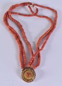 A 18CT CLASP STRING CORAL BEAD NECKLACE. 170 grams. 34 cm.