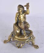 AN 18TH/19TH CENTURY BRONZE FIGURE OF A SEATED FAWN modelled holding aloft a bird. 16.5 cm high.