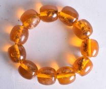 A Bug Bead Bracelet. 24cm long