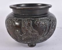 A CHINESE QING DYNASTY BRONZE CENSER decorated with scholars and landscapes. 9.5 cm wide.
