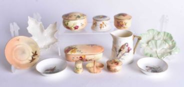 Royal Worcester barrel shaped jug painted with a Goldfinch, signed, two dishes with birds, five