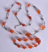 A SILVER AND AGATE NECKLACE. 67 grams. 74 cm long.