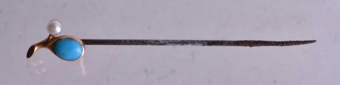 A Turquoise and Seed Pearl Stick Pin. 6.4cm x 0.9cm, weight 1.3g