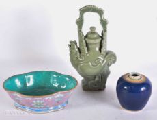 AN 18TH CENTURY CHINESE BLUE MONOCHROME PORCELAIN JAR Qianlong, together with a famille rose