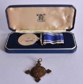 A POLICE SERVICE MEDAL presented to Constable Roy Ballen. (2)